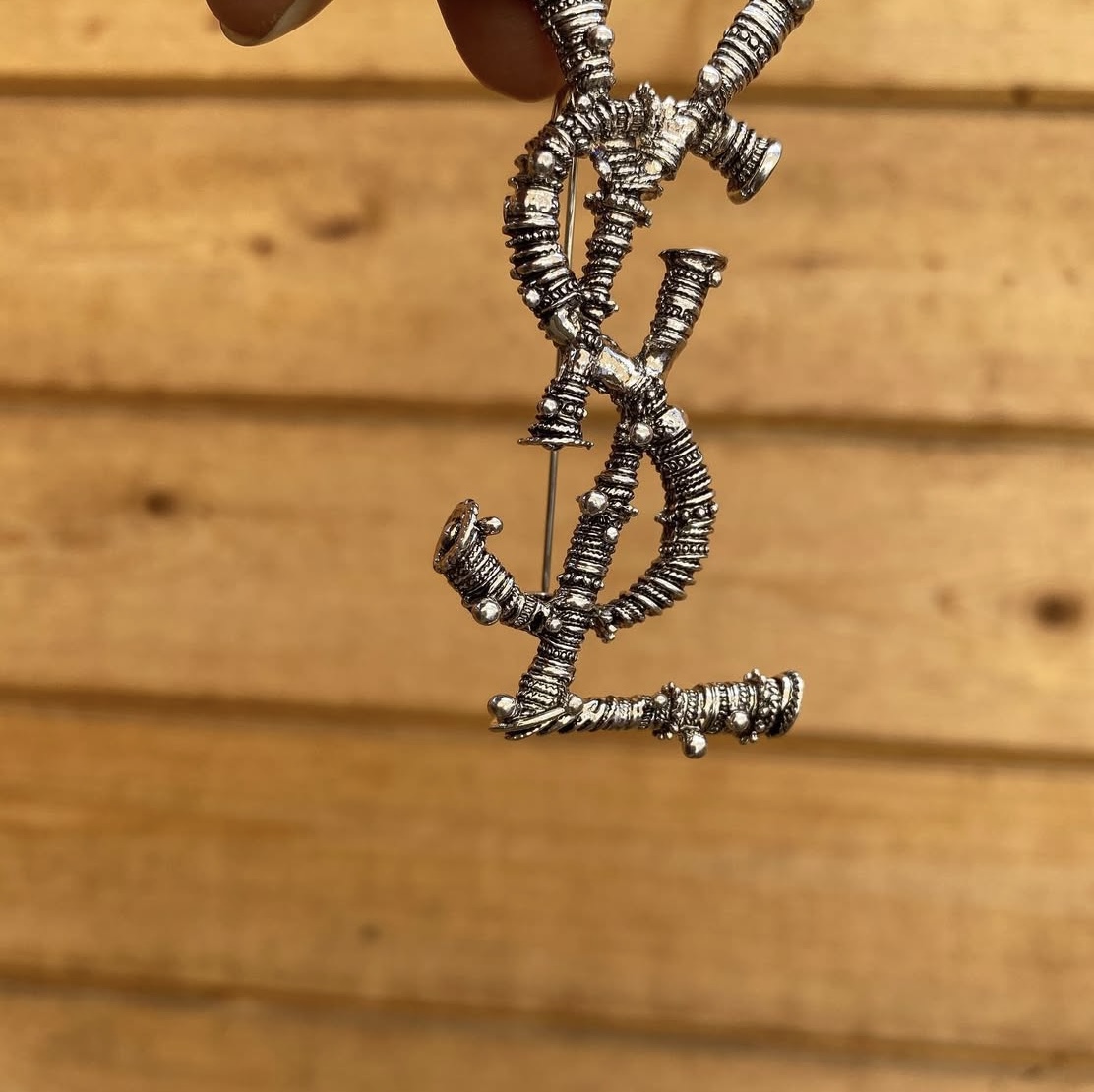 Lettered brooch
